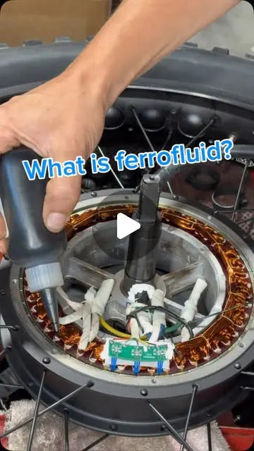 Ferrofluid being installed into the copper windings of a 10kW e-bike hub motor