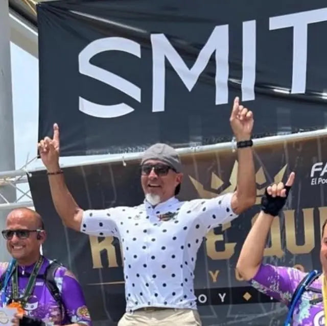 Rider celebrates 1st place finish on the HPC Trailblazer electric mountain bike at a Puerto Rico e-bike race