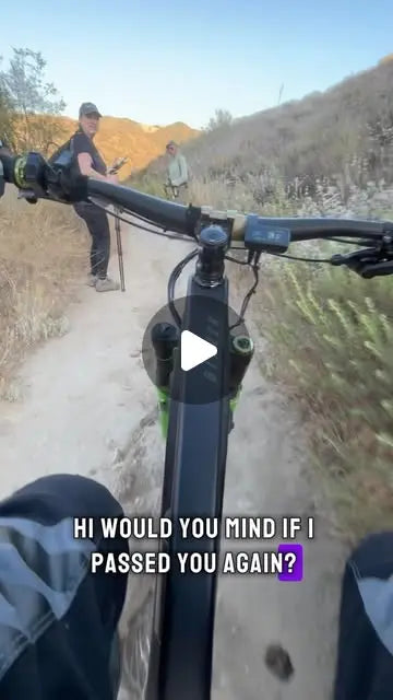 POV handlebar view climbing a dirt trail on the HPC Trailblazer electric mountain bike