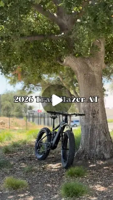 2026 HPC Trailblazer AT fat-tire electric mountain bike parked under an oak tree