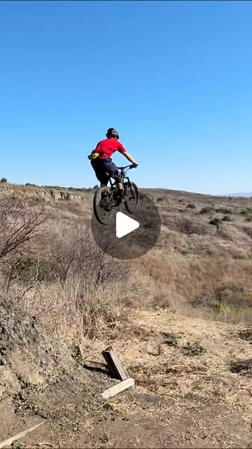 HPC Trailblazer enduro e-bike catching air, showcasing 160mm front suspension travel